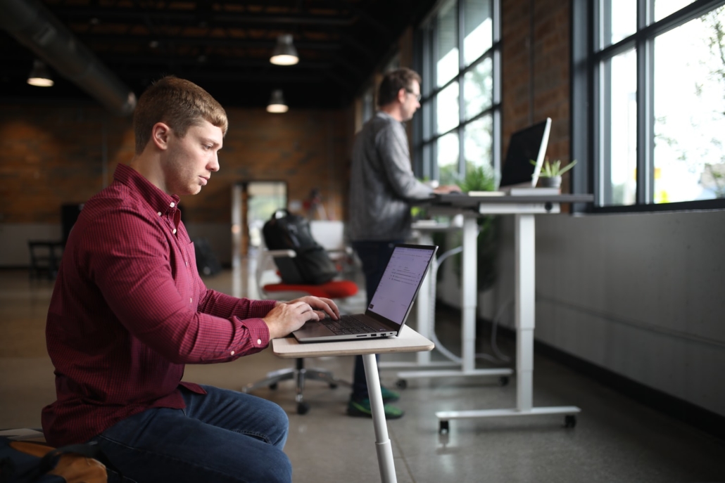 Two versions of a sit-stand workstation