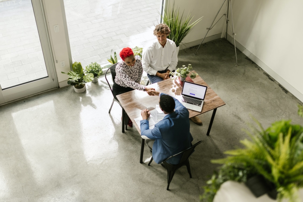 People sitting around a desk